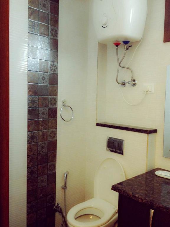 Woodpecker Service Apartments - Green Park Új-Delhi Szoba fotó